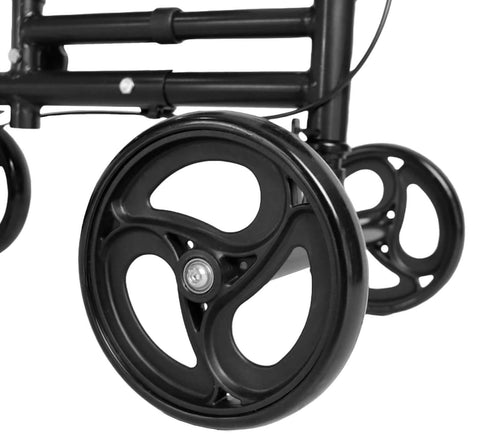 Close-up of black wheels on a mobility device with a white background