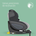 Maxi-Cosi car seat with reclining positions on a green background