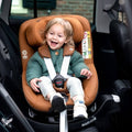 Child in a Maxi-Cosi car seat inside a vehicle