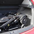 Mower in a car trunk