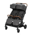 Double stroller with dark gray seats and brown handles on a white background