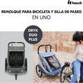 Hauck dryk duo plus bicycle trailer with a woman and child on a brick path.